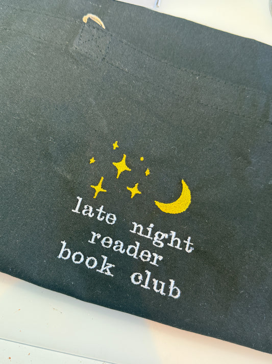 Late night reader tote bag
