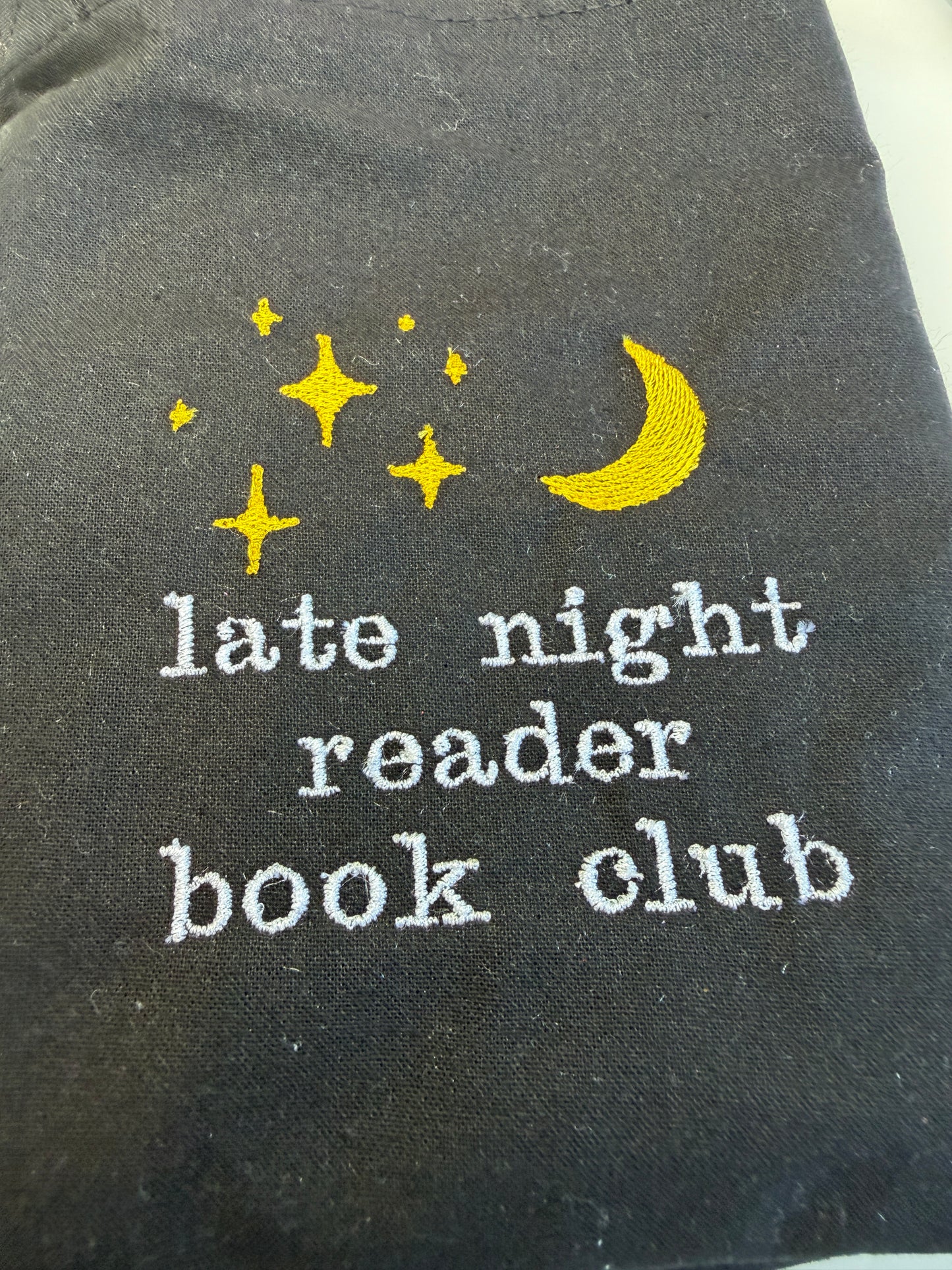 Late night reader tote bag