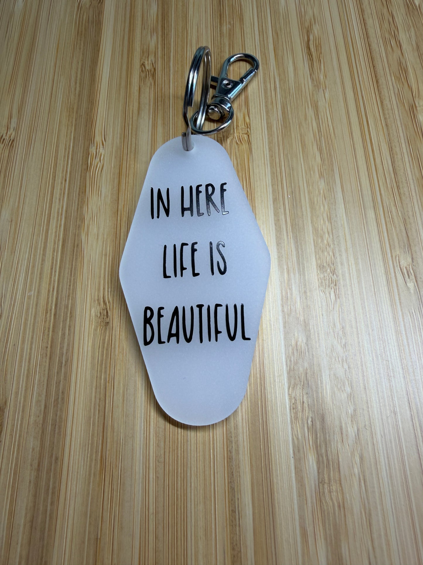 In here life is beautiful (Cabaret) motel style keyring