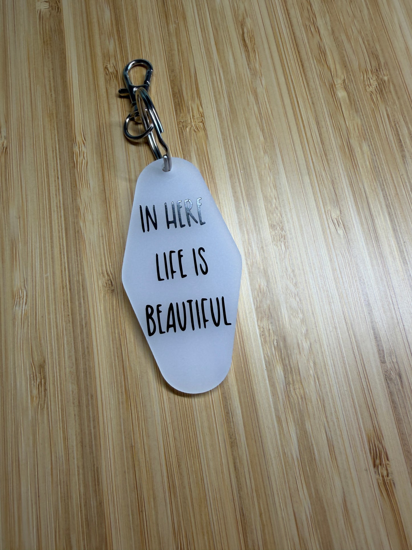 In here life is beautiful (Cabaret) motel style keyring
