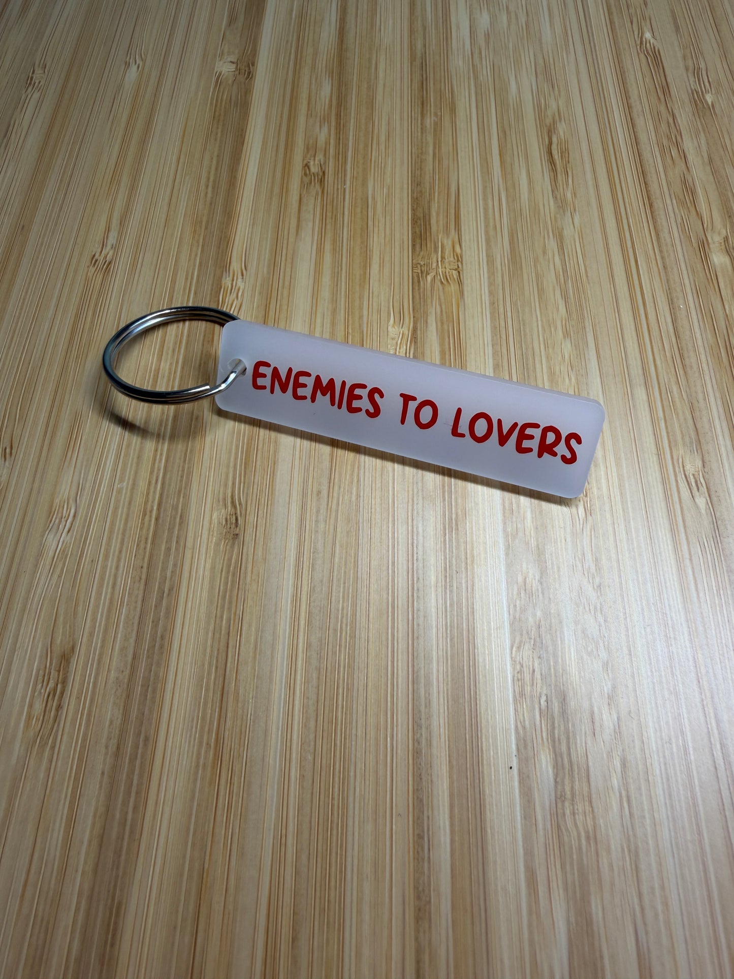 Enemies to Lovers strip style keyring