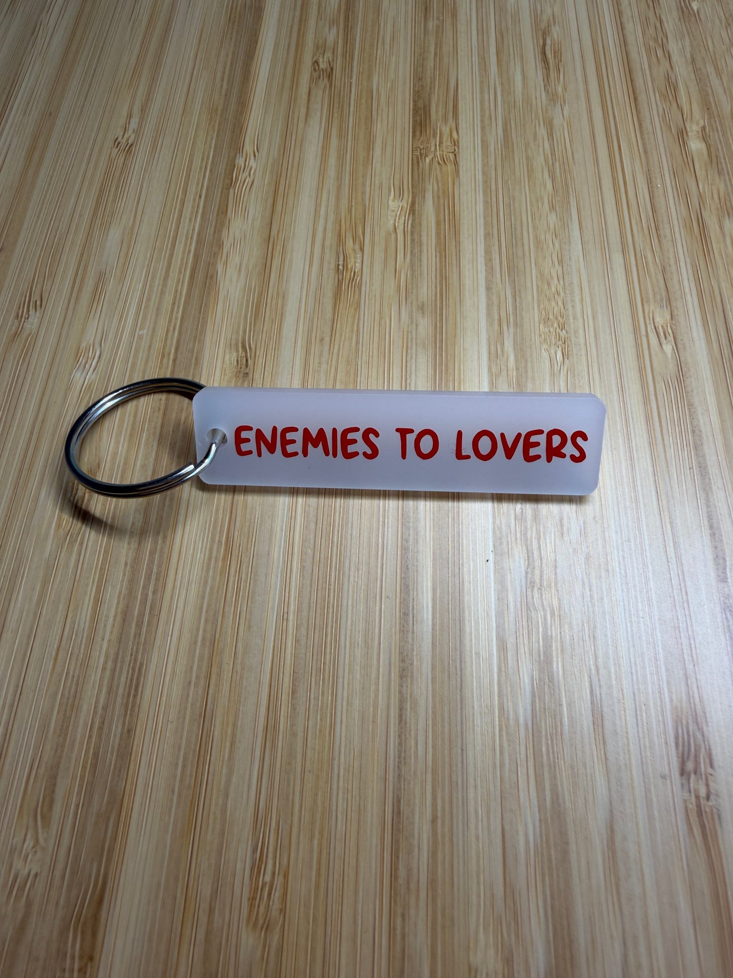 Enemies to Lovers strip style keyring