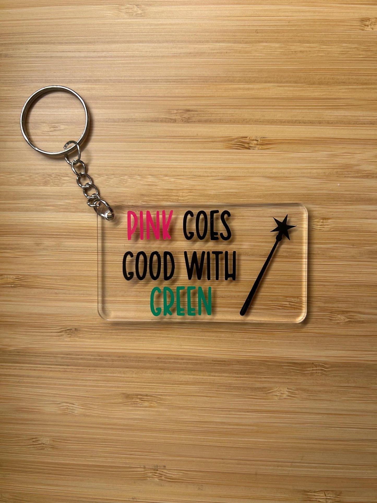 Pink goes good with green (Wicked) Keyring